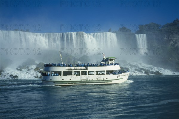 CANADA, Ontario, Niagara Falls, Maid of the Mist in front of the American Falls