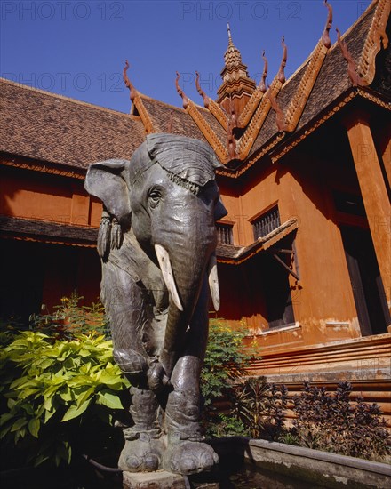 CAMBODIA, Phnom Penh, National Museum of Khmer Art and Archaeology.  Exterior and elephant statue in grounds.