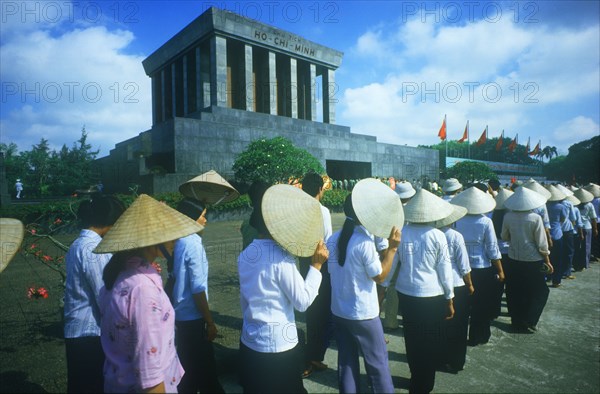 VIETNAM, Hanoi, Long line of pilgrims visiting Ho Chi Minh’s Mausoleum to commemorate his birthday on 19th May 1985.