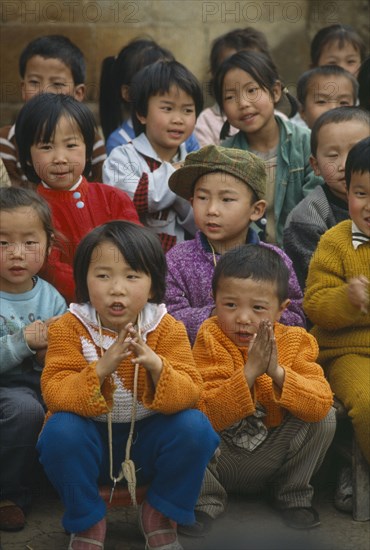 CHINA, Guizhou Province, Zhijin, Crowd of school children.