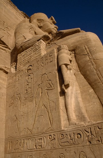 EGYPT, Abu Simbel , One of four giant statues of Ramesses II at the entrance of the Great Temple