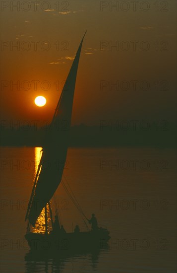 EGYPT, Luxor, Felucca on the River Nile at sunset