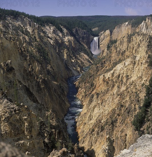 USA, Wyoming, Yellowstone , The Lower Falls waterfall seen from Artists Point as the river below cuts through the landscape