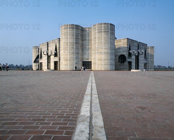 BANGLADESH, Dhaka, Modern stone parliament building with rounded towers.