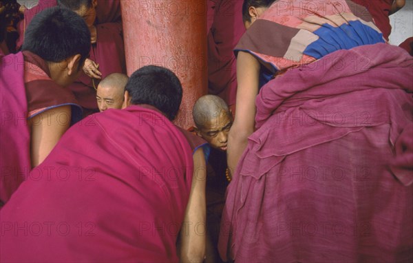 CHINA, Gansu, Xiahe , Labrang Monastery.  Novice monks debating.