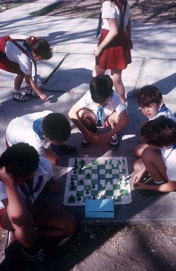 CUBA,  , Holguin, Schoolkids playing chess