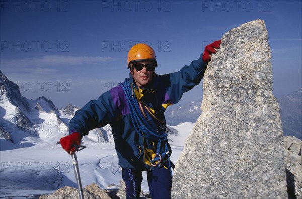 10069417 SPORT   Climbing  Man on Summit