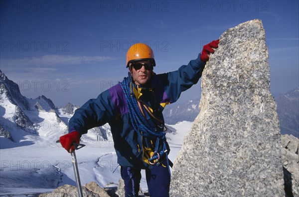 10069417 SPORT Climbing Man on Summit