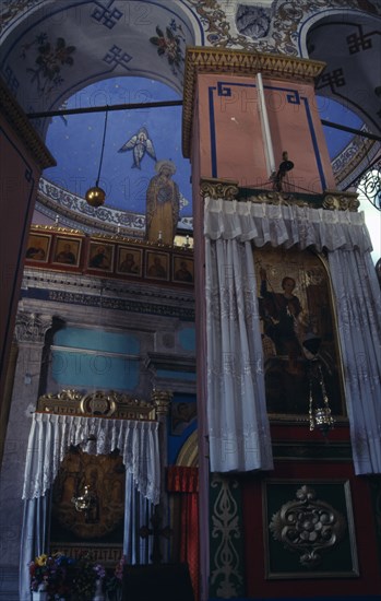 ISRAEL, Jerusalem, "Ethiopian Church interior. columns, dome, icons on walls"