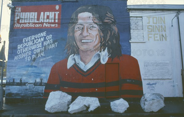 IRELAND, North, Belfast, "Bobby Sands mural on Sinn Fein headquarters on the Falls Road, corner of Sevastapol street."