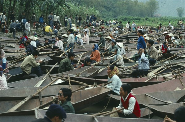 VIETNAM, Central, Hue, Small rowing boats waiting for tourist custom at the Perfume Pagoda.