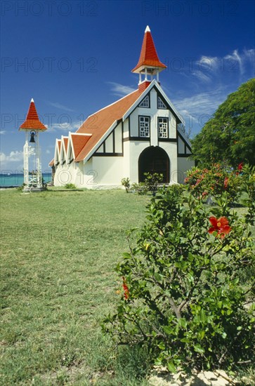 MAURITIUS,  Cap Malheureux, Red and white chapel with garden in front