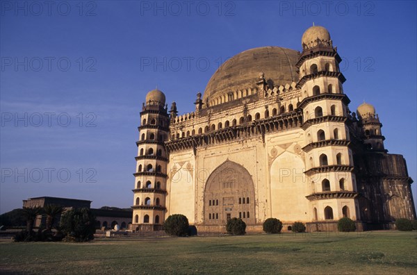 INDIA, Karnataka , Bijapur , "The Golgumbaz, mausoleum of Mohammed Adil Shah built in 1659.  Exterior view with corner towers and domed roof."