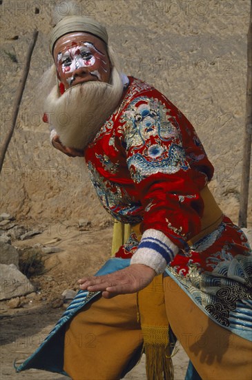 CHINA, Shaanxi , Yan’an, Opera Character in full makeup and costume.