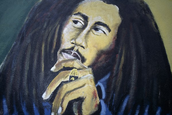 WEST INDIES, Jamaica, Kingston, Bob Marley Museum mural.