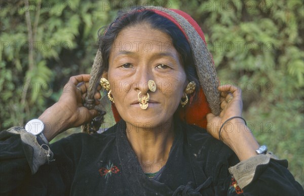 INDIA, Sikkim, People, "Woman with nose jewellery, head and shoulders portrait."
