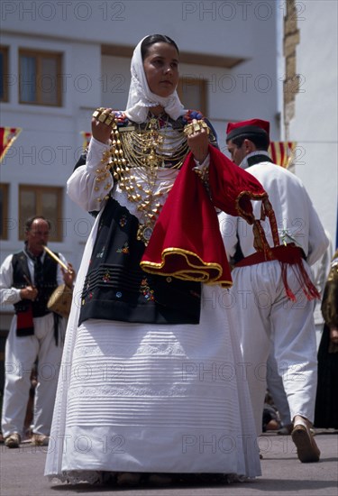 SPAIN, Balaeric Islands, Ibiza, Woman dancer in traditional dress.