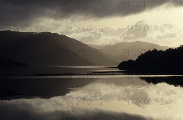 WEATHER, Rain, Rainclouds, Loch Sunart in the Scottish Highlands with the mountains and dark clouds reflected