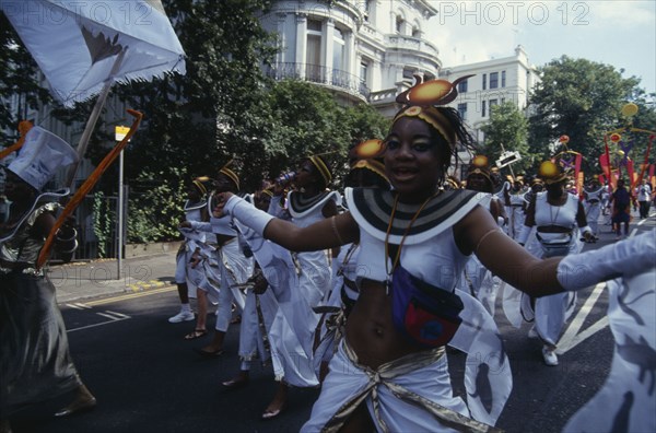 ENGLAND, London, Notting Hill, Carnival dancers in white costumes