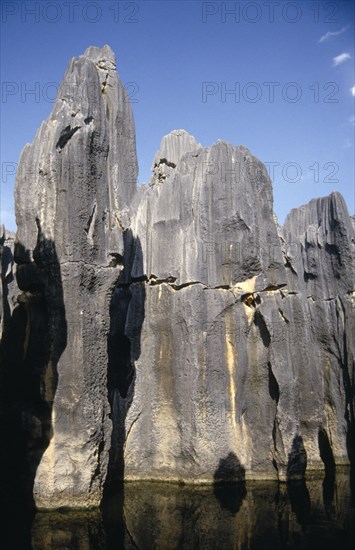 CHINA, Yunnan, Near Kunming, Stone Forest or Shilin. View of limestone pillars standing as high as 30 meters