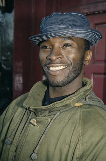 SOCIETY, People, Men, " Black man, smiling, wearing hat "