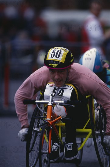 10037056 SPORT Athletics Marathon Disabled competitor in a racing wheelchair during the London Marathon.