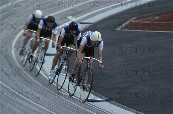 10037146 SPORT Cycling Track Manchester Wheelers Pursuit Team 1 racing on sloped track.