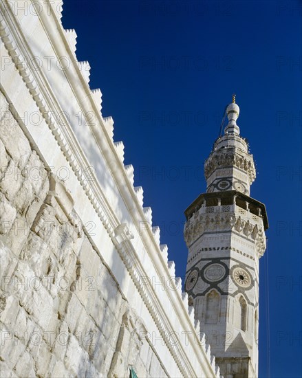 SYRIA, South, Damascus, Ummayyed Mosque. Detail of ornate wall and minaret.