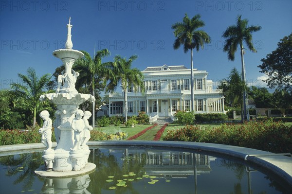 WEST INDIES, Jamaica , Kingston, Devon House with ornate fountain and water lily pond built by a rich local merchant in 1881