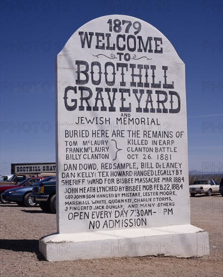 USA, Arizona, Tombstone, Boothill Graveyard. Large stone sign in shape of gravestone listing the famous graves and the Gunfight at the OK Corral