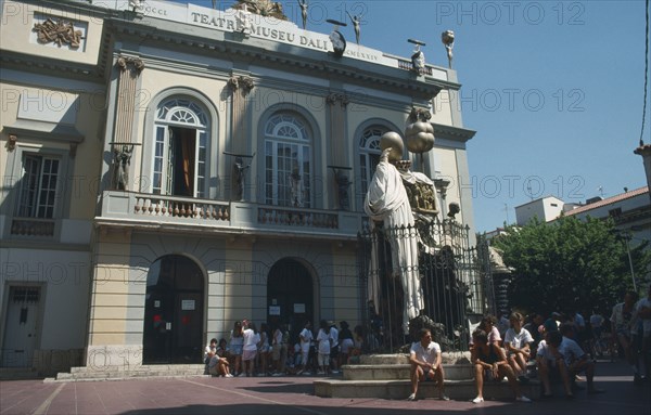 SPAIN, Figueres, Salvador Dali Theatre museum with surrealist sculpture standing outside.