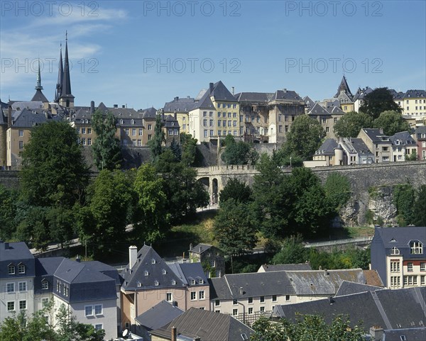 LUXEMBOURG, Luxembourg City, General view across the city rooftops showing city walland distant church spires