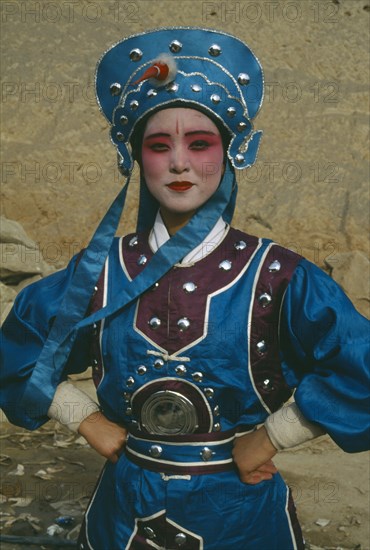 CHINA, Shaanxi, Yan’an, Opera Character in full dress and makeup