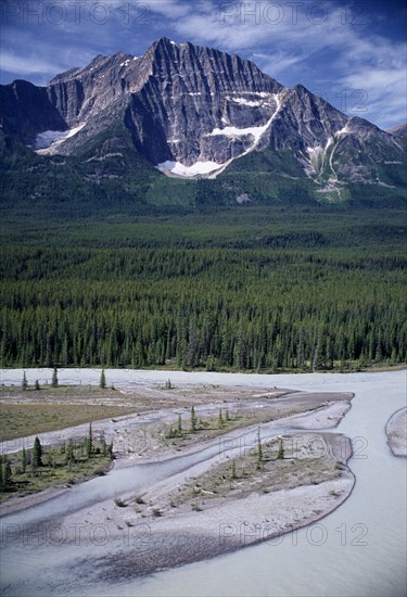 CANADA, Alberta, Jasper National Park, Columbia Ice Fields below snow capped mountains