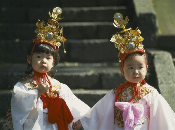 JAPAN, Honshu, Kyoto, Two young girls in costume at the Jidai Matsuri Festival Of Ages in the Gosho District