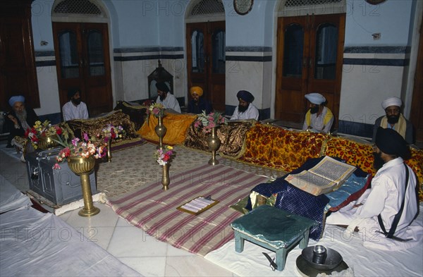 INDIA, Patna, Continuous reading of Guru Granth Sahib Sikh holy book.