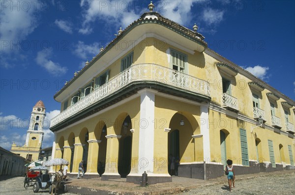 CUBA, Sancti Spiritus, Trinidad, Yellow and white painted Museo Romantico in the Palacio Brunet at one corner of Marti Square