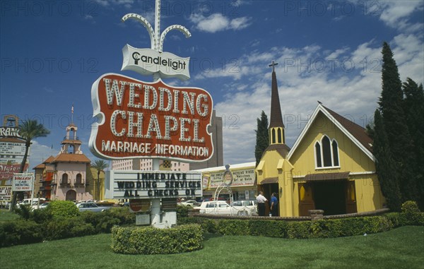 USA, Nevada Wedding Chapel, Las Vegas, Candlelight wedding chapel and sign on The Strip