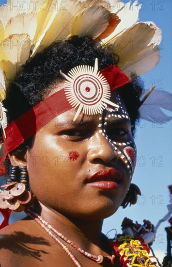 PAPUA NEW GUINEA, Trobriand Islands, Portrait of girl in traditonal costume at the fifth Pacific Arts Festival