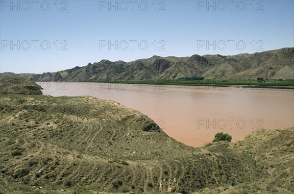 CHINA, Yellow River, Loess riverbanks and view down river