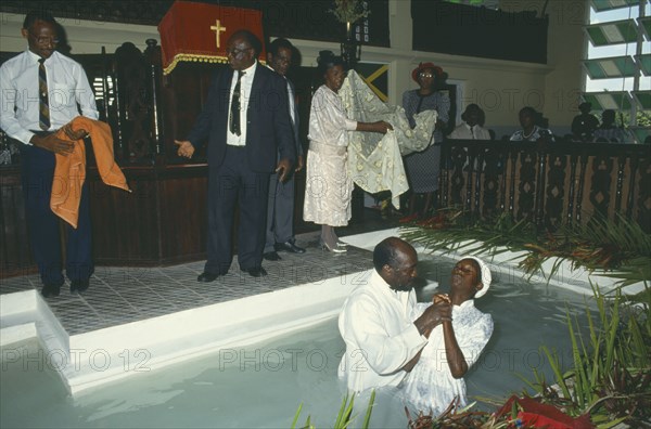 WEST INDIES, Jamaica, Montego Bay, Total immersion baptism in Baptist church