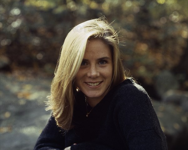 PEOPLE, Women, Girls, " Portrait of blonde haired, smiling girl. Dark blue jumper and necklace. mf.1295.1058 "