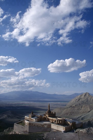 TURKEY, Dogubeyazit, Ishak Pasha Palace. View over hillside palace toward mountainous horizon