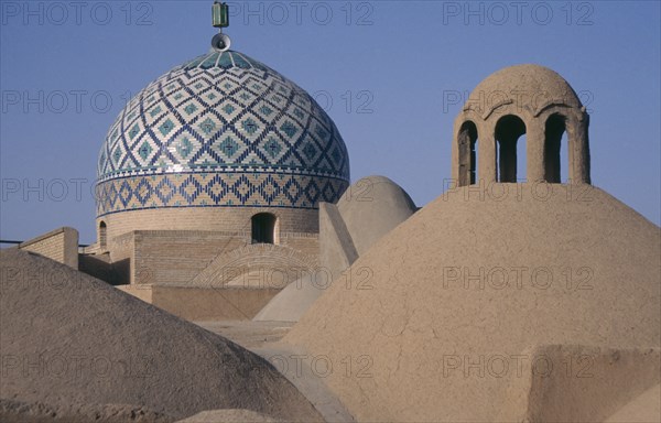 IRAN, Yazd, View over rooftops and dome of the Old city Mosque