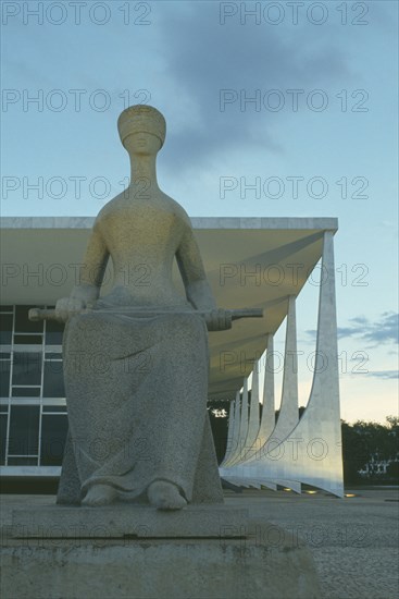BRAZIL, Federal District, Brasilia, Statue of Justice standing outside the Supremo Tribunal Federal.