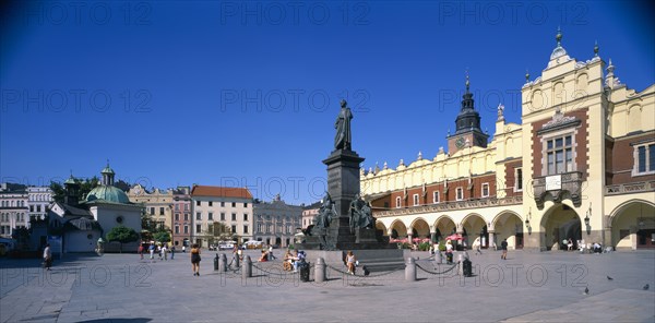 POLAND, Krakow , View across Rynek Glowny or Grand Square and the sixteenth century Renaissance Cloth Hall covered market.