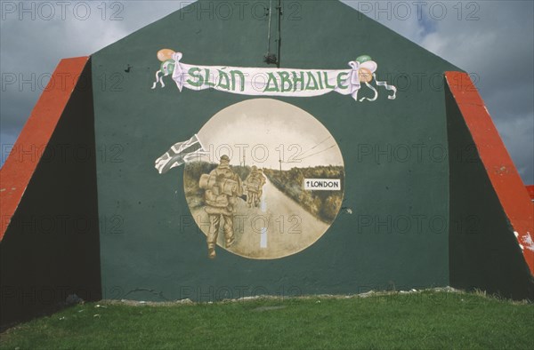 IRELAND, North , Derry, "Reverse side of the Now Entering Free Derry Gable Wall, Mural depicting British Soldiers leaving on the road to London,from the Bogside area."