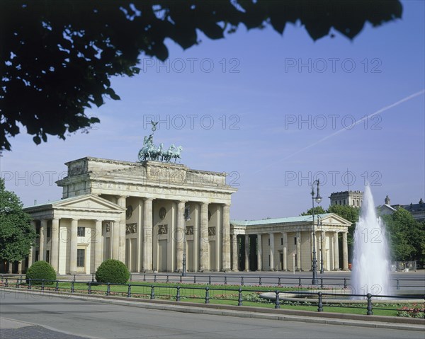 GERMANY, Berlin State, Berlin, Brandenburg Gate showing the front and one side with a fountain in the foreground