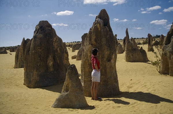 AUSTRALIA, Western Australia, Nambung National Park, Rock pinnacles in desert landscape.