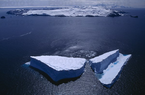 ANTARCTICA , Deception Island,  Aerial view of icebergs off  the island